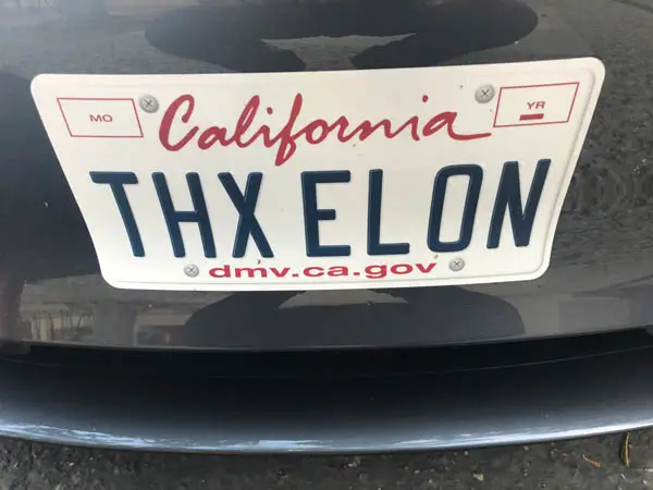 Adhesive license plate replica